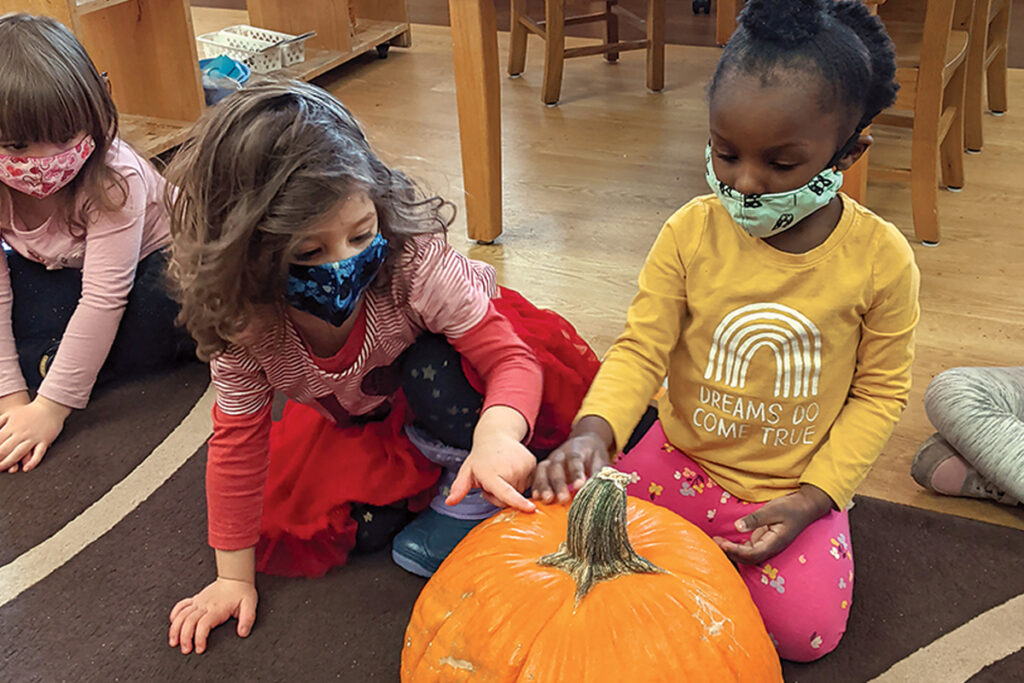 kids with pumpkin