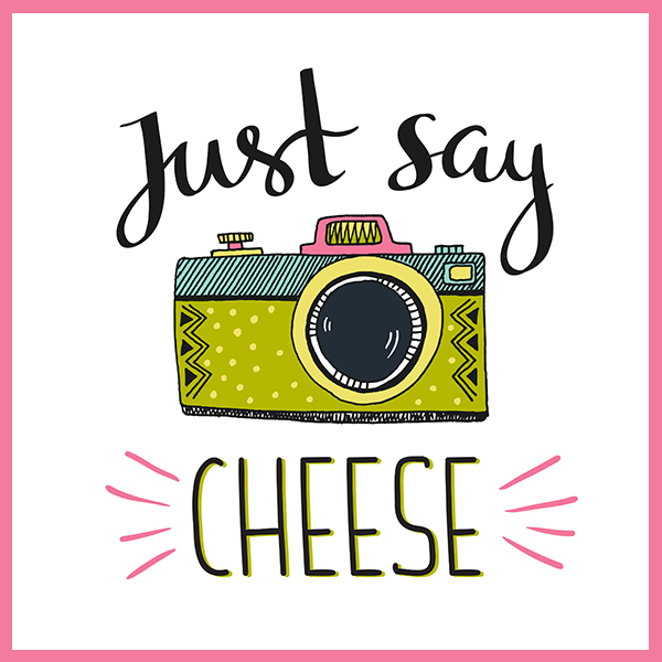 A stylized drawing of a camera surrounded by the words "Just say CHEESE"